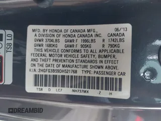 2013 Honda Civic Cpe LX with VIN 2HGFG3B59DH521768, listed as a IAAI auction lot 41231533 with 256,349 mi miles. Bid and sale history available at carsss.com. Image 9.