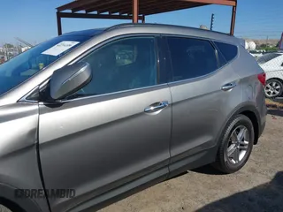 2017 Hyundai Santa Fe 2.4L z VIN 5XYZU3LB4HG446961, wystawiony jako IAAI lot #42214109 z przebiegiem 140 175 mil mil oraz . Historia ofert i sprzedaży dostępna na DreamBid. Obrazek 14.
