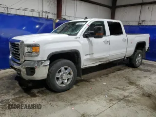2018 GMC Sierra 2500HD SLE с VIN 1GT12SEG3JF209411, выставлен на аукционе Copart как лот 77878184 с пробегом 105 288 миль миль и Чистый • Clean title. История ставок и продаж доступна на DreamBid. Изображение 1.