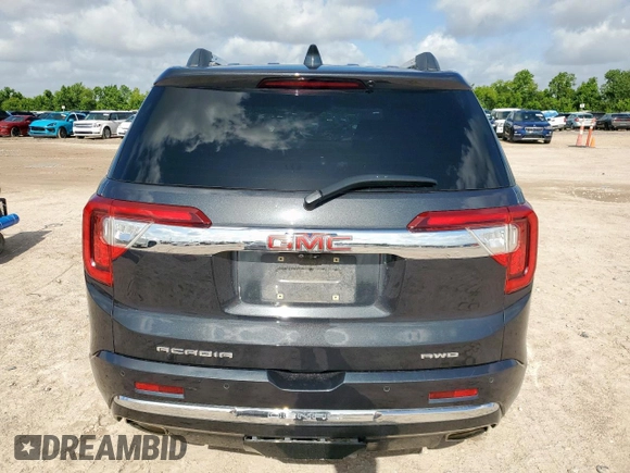 2022 GMC Acadia Denali with VIN 1GKKNXLS7NZ113483, listed as a Copart auction lot 61395605 with 64,934 mi miles and Salvage title. Bid and sale history available at DreamBid. Image 6.