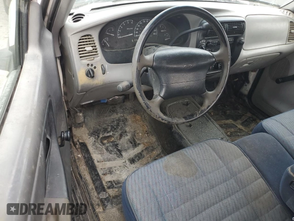 1997 Ford Ranger XL with VIN 1FTCR15U3VPA39507, listed as a Copart auction lot 74720434 with 156,144 mi miles and Salvage title. Bid and sale history available at DreamBid. Image 8.