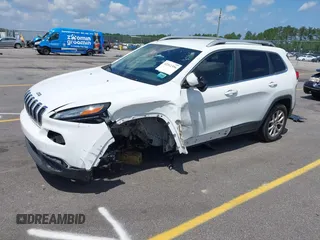 2016 Jeep Cherokee Latitude with VIN 1C4PJLCB0GW291357, listed as a IAAI auction lot 42312356 with 105,692 mi miles and . Bid and sale history available at DreamBid. Image 23.
