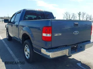 2004 Ford F-150 XLT with VIN 1FTRW14W24KA27415, listed as a IAAI auction lot 42081888 with 149,897 mi miles. Bid and sale history available at carsss.com. Image 3.