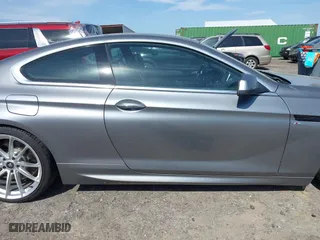 2012 BMW 6 Series 650i with VIN WBALX3C5XCC528484, listed as a IAAI auction lot 42080063 with 120,995 mi miles. Bid and sale history available at carsss.com. Image 13.
