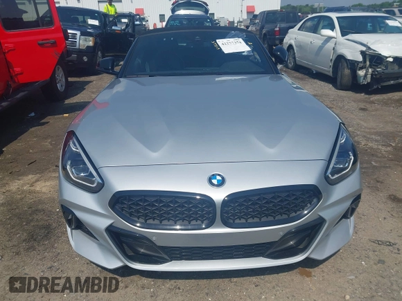 2021 BMW Z4 sDriveM40i z VIN WBAHF9C00MWX17614, wystawiony jako IAAI lot #42277354 z przebiegiem 26 615 mil mil oraz . Historia ofert i sprzedaży dostępna na DreamBid. Obrazek 11.