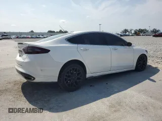 2014 Ford Fusion Titanium с VIN 3FA6P0D93ER205744, выставлен на аукционе Copart как лот 56228345 с пробегом 160 882 миль миль и Списание • Salvage title. История ставок и продаж доступна на DreamBid. Изображение 3.