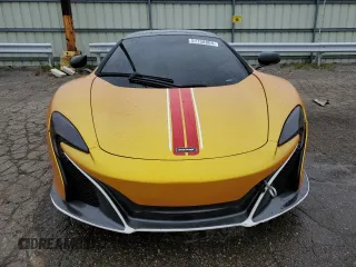 2015 McLaren 650S z VIN SBM11FAA0FW004199, wystawiony jako Copart lot #51758804 z przebiegiem 65 073 mil mil oraz Szkody całkowita. Historia ofert i sprzedaży dostępna na DreamBid. Obrazek 5.