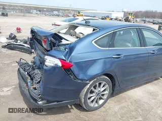 2018 Ford Fusion Energi SE with VIN 3FA6P0PU0JR196091, listed as a IAAI auction lot 42017867 with 70,284 mi miles. Bid and sale history available at carsss.com. Image 6.