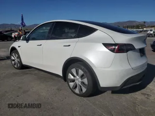 2024 Tesla Model Y Long Range with VIN 7SAYGDEE6RA261884, listed as a Copart auction lot 47639025 with 23,377 mi miles and Salvage Title. Bid and sale history available at DreamBid. Image 2.