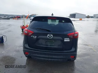 2016 Mazda CX-5 Grand Touring with VIN JM3KE4DY3G0769448, listed as a IAAI auction lot 41947725 with 154,051 mi miles and . Bid and sale history available at carsss.com. Image 16.