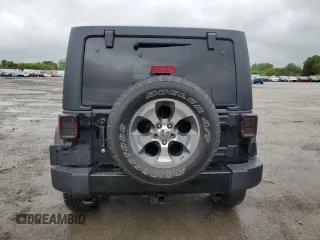2017 Jeep Wrangler Unlimited Sahara with VIN 1C4BJWEGXHL594203, listed as a Copart auction lot 57359515 with 101,763 mi miles and Salvage title. Bid and sale history available at DreamBid. Image 6.