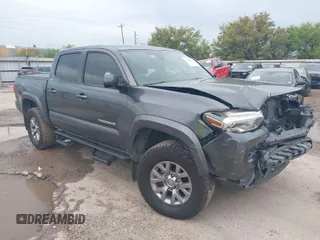 2018 Toyota Tacoma SR5 with VIN 5TFAZ5CN5JX062498, listed as a IAAI auction lot 41867393 with 128,879 mi miles and . Bid and sale history available at DreamBid. Image 1.