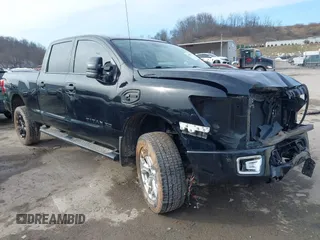 2018 Nissan Titan XD SV with VIN 1N6BA1F49JN521838, listed as a IAAI auction lot 41606878 with 143,742 mi miles. Bid and sale history available at carsss.com. Image 1.