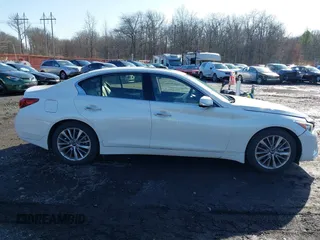 2023 Infiniti Q50 Luxe z VIN JN1EV7BR8PM540570, wystawiony jako IAAI lot #41131629 z przebiegiem 5 964 mil mil oraz . Historia ofert i sprzedaży dostępna na DreamBid. Obrazek 13.