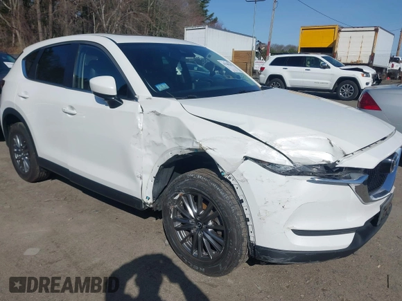2017 Mazda CX-5 Touring z VIN JM3KFBCL8H0214052, wystawiony jako IAAI lot #41940783 z przebiegiem 120 083 mil mil oraz . Historia ofert i sprzedaży dostępna na DreamBid. Obrazek 1.