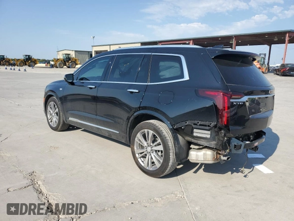 2024 Cadillac XT6 FWD Premium Luxury with VIN 1GYKPCRS7RZ710803, listed as a Copart auction lot 75160764 with 10,409 mi miles and Salvage Title. Bid and sale history available at carsss.com. Image 2.