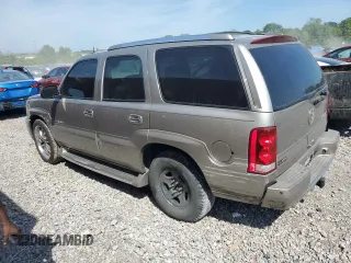 2003 Cadillac Escalade z VIN 1GYEC63T83R157632, wystawiony jako Copart lot #54950564 z przebiegiem 88 527 mil mil oraz Szkoda całkowita • Salvage title. Historia ofert i sprzedaży dostępna na DreamBid. Obrazek 2.