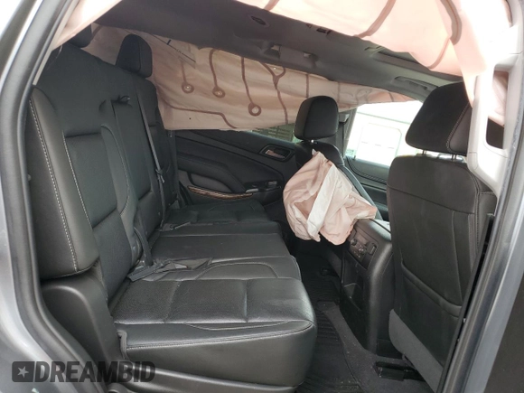 2020 Chevrolet Tahoe Premier with VIN 1GNSKCKC7LR125399, listed as a Copart auction lot 54702635 with 134,684 mi miles and Salvage title. Bid and sale history available at DreamBid. Image 10.
