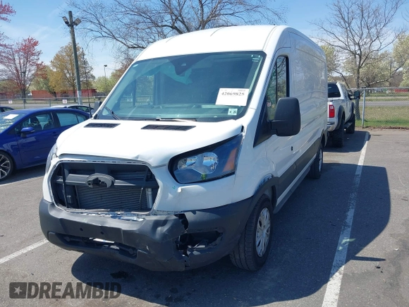 2024 Ford Transit Cargo z VIN 1FTBR1C84RKA39388, wystawiony jako IAAI lot #42069825 z przebiegiem 20 851 mil mil oraz . Historia ofert i sprzedaży dostępna na DreamBid. Obrazek 2.