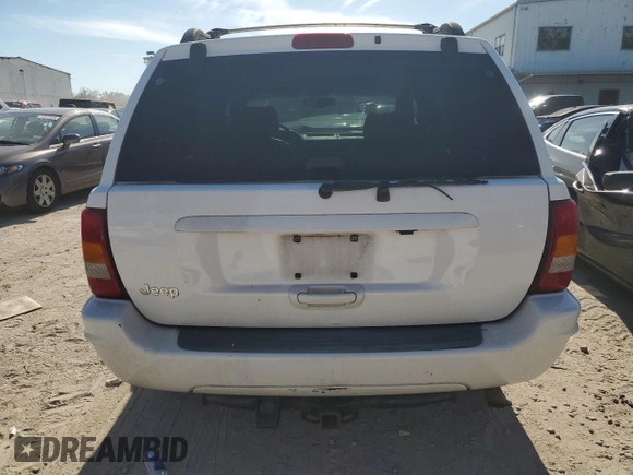2002 Jeep Grand Cherokee Limited with VIN 1J4GX58S32C320843, listed as a Copart auction lot 77663864 with 289,537 mi miles and Salvage Title. Bid and sale history available at DreamBid. Image 6.
