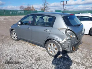 2009 Nissan Versa 1.8 SL with VIN 3N1BC13E69L390702, listed as a IAAI auction lot 41202841 with 33,709 mi miles. Bid and sale history available at carsss.com. Image 3.
