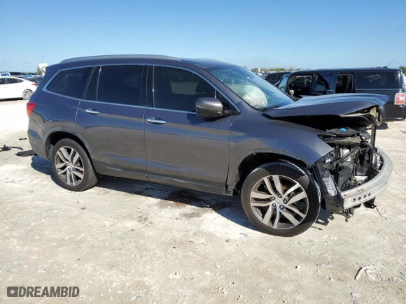 2017 Honda Pilot Touring with VIN 5FNYF5H94HB011565, listed as a Copart auction lot 47035975 with 0 mi miles and Salvage Title. Bid and sale history available at carsss.com. Image 4.