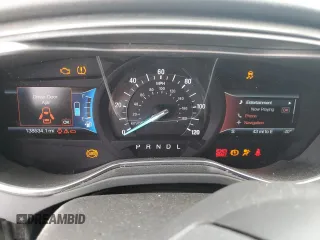 2016 Ford Fusion Titanium Hybrid z VIN 3FA6P0RU6GR139495, wystawiony jako Copart lot #52381235 z przebiegiem 138 534 mil mil oraz Czysty tytuł • Clean title. Historia ofert i sprzedaży dostępna na DreamBid. Obrazek 9.