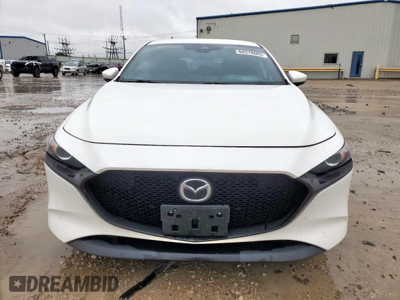 2019 Mazda 3 with VIN JM1BPBJM2K1136404, listed as a Copart auction lot 60378665 with 61,903 mi miles and Salvage title. Bid and sale history available at DreamBid. Image 5.