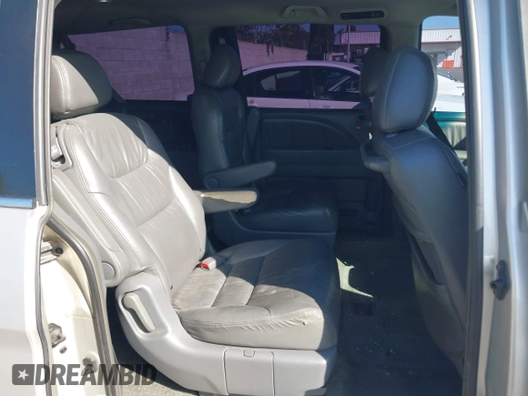 2005 Honda Odyssey TOURING with VIN 5FNRL38865B128519, listed as a IAAI auction lot 41830182 with 171,010 mi miles. Bid and sale history available at carsss.com. Image 8.