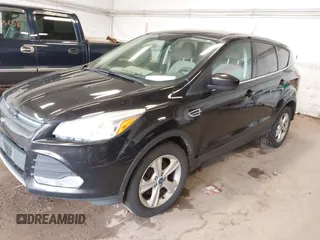 2013 Ford Escape SE with VIN 1FMCU0G99DUA53182, listed as a IAAI auction lot 42613814 with 198,330 mi miles and . Bid and sale history available at DreamBid. Image 2.