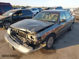 2004 Ford Crown Victoria Standard with VIN 2FAFP73W64X107579, listed as a IAAI auction lot 41823273 with 131,921 mi miles. Bid and sale history available at carsss.com. Image 18.