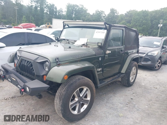 2008 Jeep Wrangler Sahara with VIN 1J4FA54118L653044, listed as a IAAI auction lot 42557244 with 152,072 mi miles and . Bid and sale history available at DreamBid. Image 18.