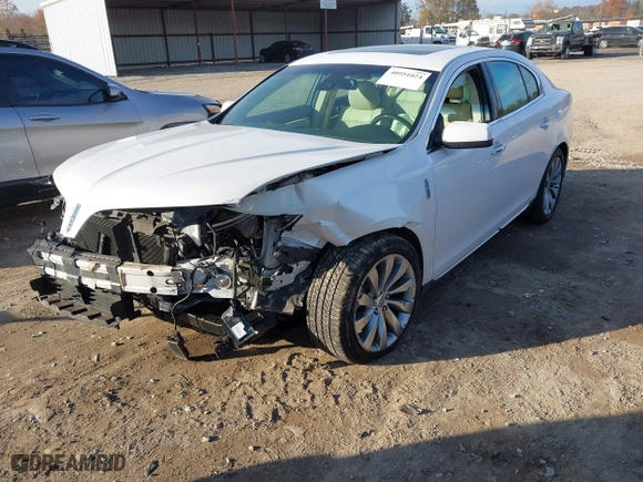 2014 Lincoln MKS with VIN 1LNHL9DK3EG600791, listed as a IAAI auction lot 40951024 with 81,734 mi miles. Bid and sale history available at carsss.com. Image 17.