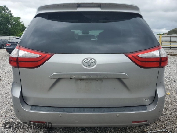 2016 Toyota Sienna XLE with VIN 5TDYK3DC8GS707910, listed as a Copart auction lot 58418535 with 161,527 mi miles and Salvage title. Bid and sale history available at DreamBid. Image 6.