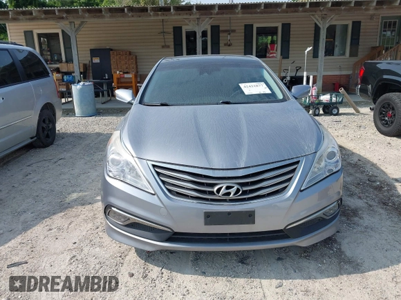 2015 Hyundai Azera Limited z VIN KMHFH4JG2FA483575, wystawiony jako IAAI lot #42422877 z przebiegiem 111 147 mil mil oraz . Historia ofert i sprzedaży dostępna na DreamBid. Obrazek 6.