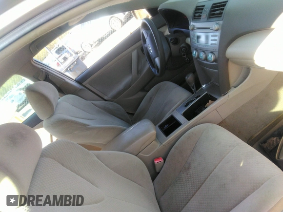 2007 Toyota Camry CE with VIN 4T1BE46K77U574068, listed as a IAAI auction lot 41934219 with 287,702 mi miles. Bid and sale history available at carsss.com. Image 5.