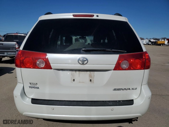2010 Toyota Sienna XLE with VIN 5TDYK4CC8AS311023, listed as a Copart auction lot 47574285 with 209,186 mi miles and Salvage Title. Bid and sale history available at carsss.com. Image 6.