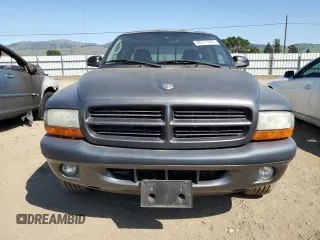 2002 Dodge Dakota z VIN 1B7GL32N62S551525, wystawiony jako Copart lot #48777025 z przebiegiem 91 438 mil mil oraz Czysty tytuł • Clean title. Historia ofert i sprzedaży dostępna na DreamBid. Obrazek 5.