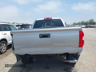 2016 Toyota Tundra SR z VIN 5TFRM5F1XGX099453, wystawiony jako IAAI lot #42492840 z przebiegiem 54 060 mil mil oraz . Historia ofert i sprzedaży dostępna na DreamBid. Obrazek 17.