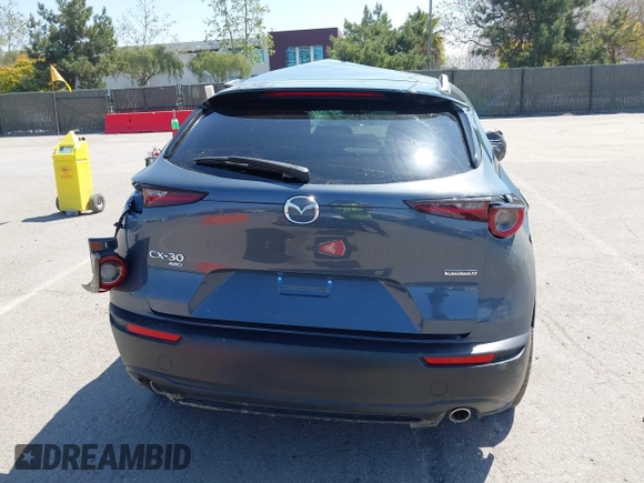 2024 Mazda CX-30 S Preferred z VIN 3MVDMBCMXRM640631, wystawiony jako IAAI lot #41900958 z przebiegiem 10 332 mil mil oraz . Historia ofert i sprzedaży dostępna na DreamBid. Obrazek 16.