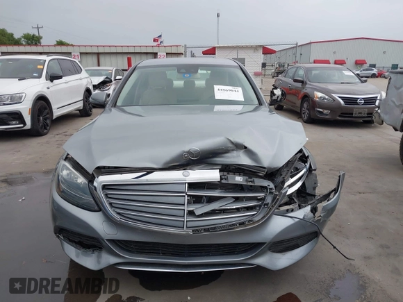 2016 Mercedes-Benz C 300 Luxury with VIN 55SWF4KB7GU144072, listed as a IAAI auction lot 41869044 with 60,208 mi miles and . Bid and sale history available at carsss.com. Image 6.