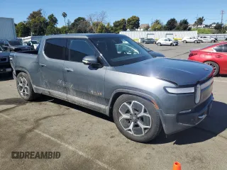 2022 Rivian R1T Adventure z VIN 7FCTGAAA5NN014843, wystawiony jako Copart lot #47668545 z przebiegiem 42 640 mil mil oraz Szkody całkowita. Historia ofert i sprzedaży dostępna na DreamBid. Obrazek 4.