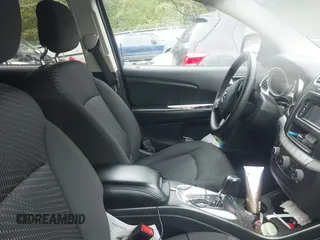 2016 Dodge Journey SXT with VIN 3C4PDCBG2GT100550, listed as a IAAI auction lot 41982670 with 184,601 mi miles. Bid and sale history available at carsss.com. Image 5.