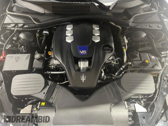 2014 Maserati Ghibli S Q4 z VIN ZAM57RTA9E1112724, wystawiony jako Copart lot #73739204 z przebiegiem 45 525 mil mil oraz Szkoda całkowita • Salvage title. Historia ofert i sprzedaży dostępna na DreamBid. Obrazek 7.