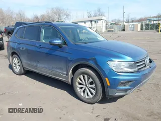 2018 Volkswagen Tiguan S with VIN 3VV0B7AX9JM159226, listed as a IAAI auction lot 41809505 with 96,499 mi miles and . Bid and sale history available at DreamBid. Image 1.