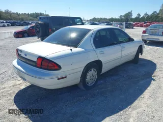 1998 Chevrolet Lumina with VIN 2G1WL52M9W9118618, listed as a IAAI auction lot 41582985 with 105,833 mi miles and . Bid and sale history available at DreamBid. Image 4.