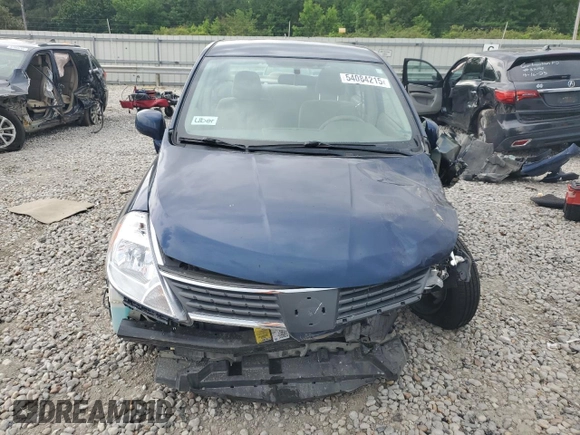 2009 Nissan Versa S with VIN 3N1BC11E19L433572, listed as a Copart auction lot 54084215 with 144,178 mi miles and Salvage title. Bid and sale history available at DreamBid. Image 5.