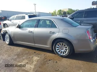 2014 Chrysler 300 with VIN 2C3CCAAG4EH159911, listed as a IAAI auction lot 41963042 with 105,972 mi miles and . Bid and sale history available at DreamBid. Image 14.