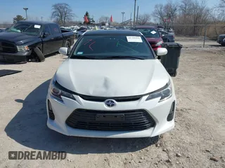 2016 Scion tC with VIN JTKJF5C70GJ019590, listed as a IAAI auction lot 41798426 with 69,045 mi miles. Bid and sale history available at carsss.com. Image 12.