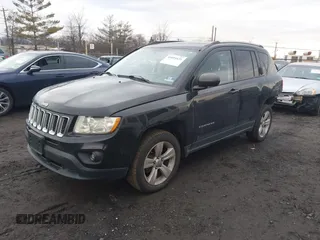 2013 Jeep Compass Latitude with VIN 1C4NJDEB3DD221904, listed as a IAAI auction lot 41691631 with 134,683 mi miles. Bid and sale history available at carsss.com. Image 2.